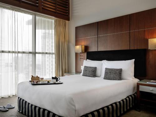 ESTUDIO, Una Cama King del hotel Pullman Auckland Hotel & Apartments. Foto 1