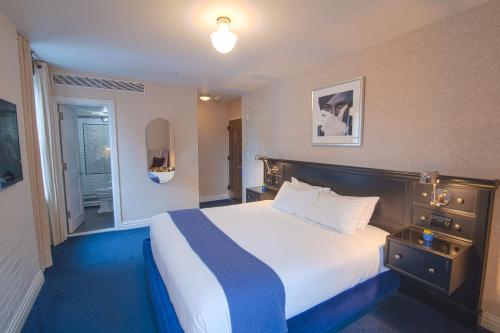 Habitación Premium con cama extragrande del hotel The Frederick. Foto 2