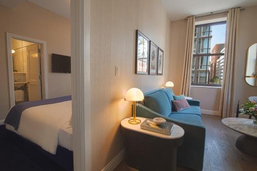 Suite Tribeca con 2 camas dobles y sofá cama del hotel The Frederick