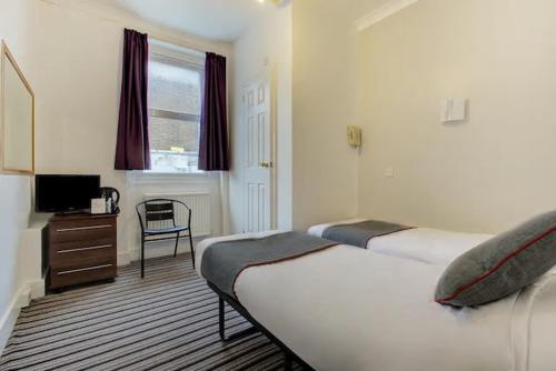 Habitación Doble Estándar - 2 camas del hotel Enrico. Foto 1