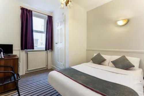 Habitación Doble Estándar del hotel Enrico. Foto 3