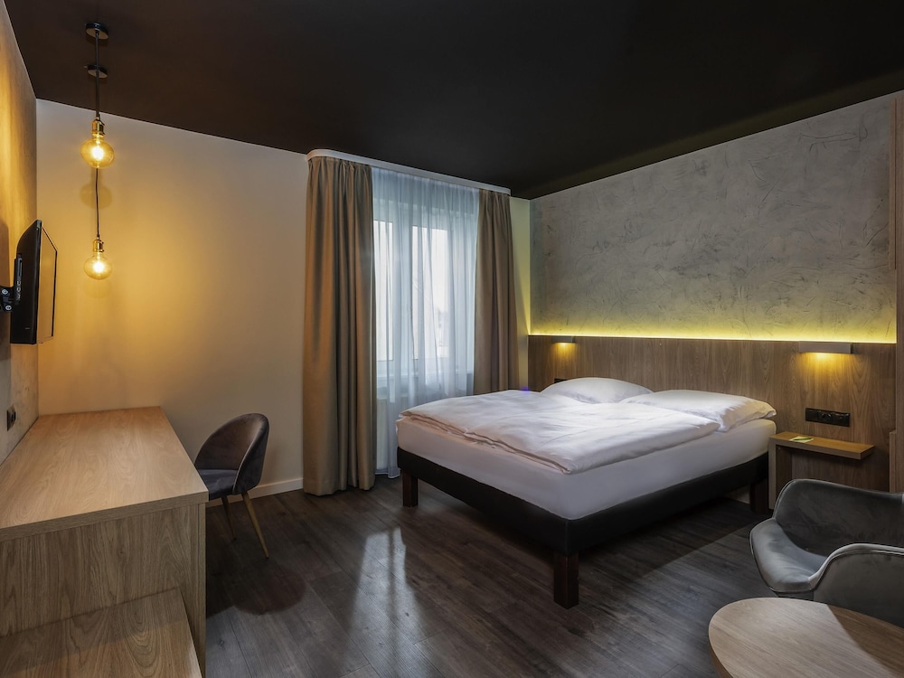 Habitación Doble Estándar del hotel ibis Styles Dresden Neustadt. Foto 1