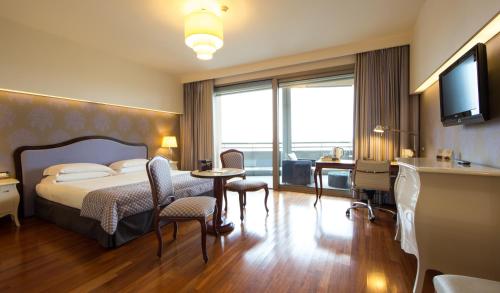 Suite del hotel Unahotels Expo Fiera Milano. Foto 3
