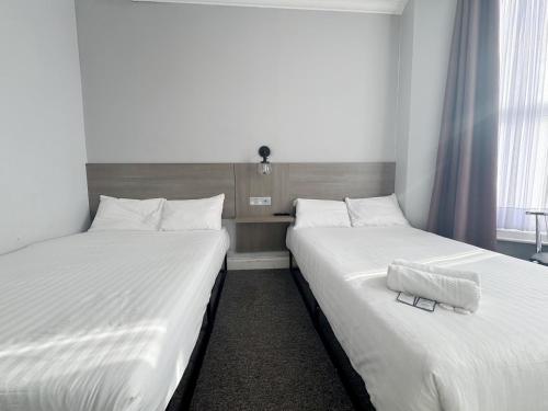 Habitación cuádruple del hotel Plaza hotel. Foto 6