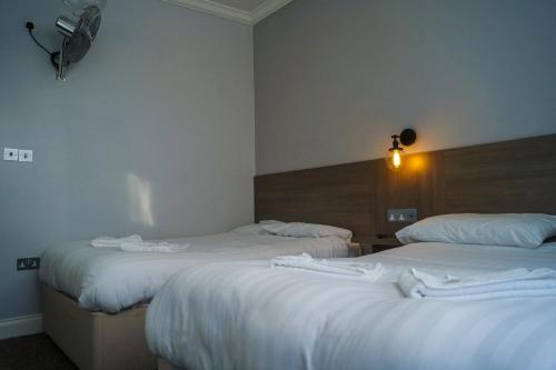 Habitación cuádruple del hotel Plaza hotel. Foto 7