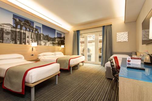 Habitación cuádruple del hotel iQ Hotel Roma. Foto 3
