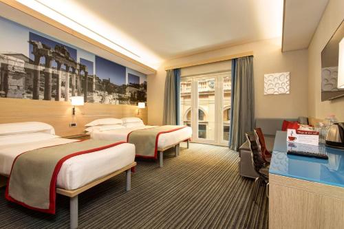 Habitación cuádruple del hotel iQ Hotel Roma. Foto 4