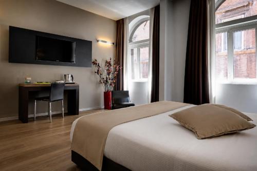 Habitación Familiar del hotel Rinascimento. Foto 1