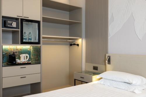 Habitación Triple Confort del hotel Abacus. Foto 3