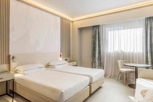 Habitación Triple Confort del hotel Abacus. Foto 6