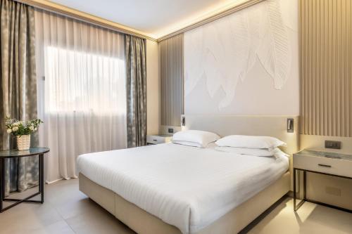 Habitación Doble Deluxe con ducha del hotel Abacus. Foto 1