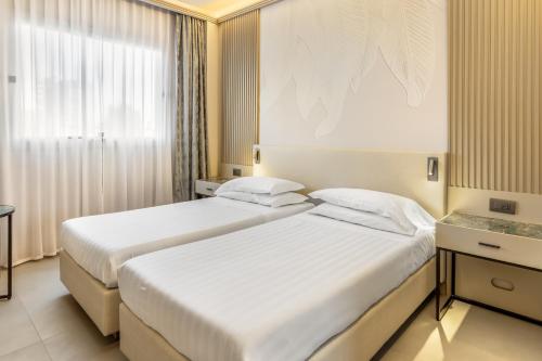 Habitación Doble Deluxe - 2 camas del hotel Abacus. Foto 10