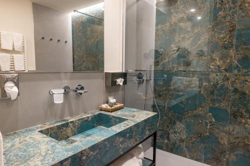 Habitación Cuádruple Deluxe del hotel Abacus. Foto 4