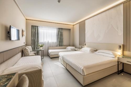 Habitación Cuádruple Deluxe del hotel Abacus. Foto 6