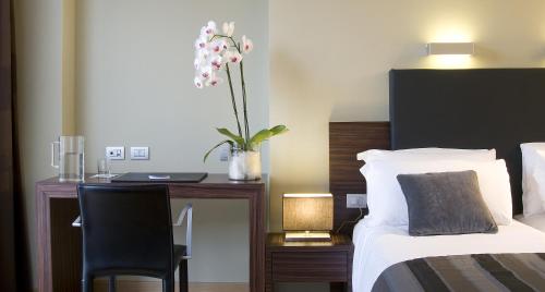 Habitación Triple del hotel Trevi Collection. Foto 1