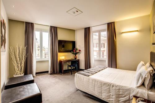 Habitación cuádruple del hotel Trevi Collection. Foto 7