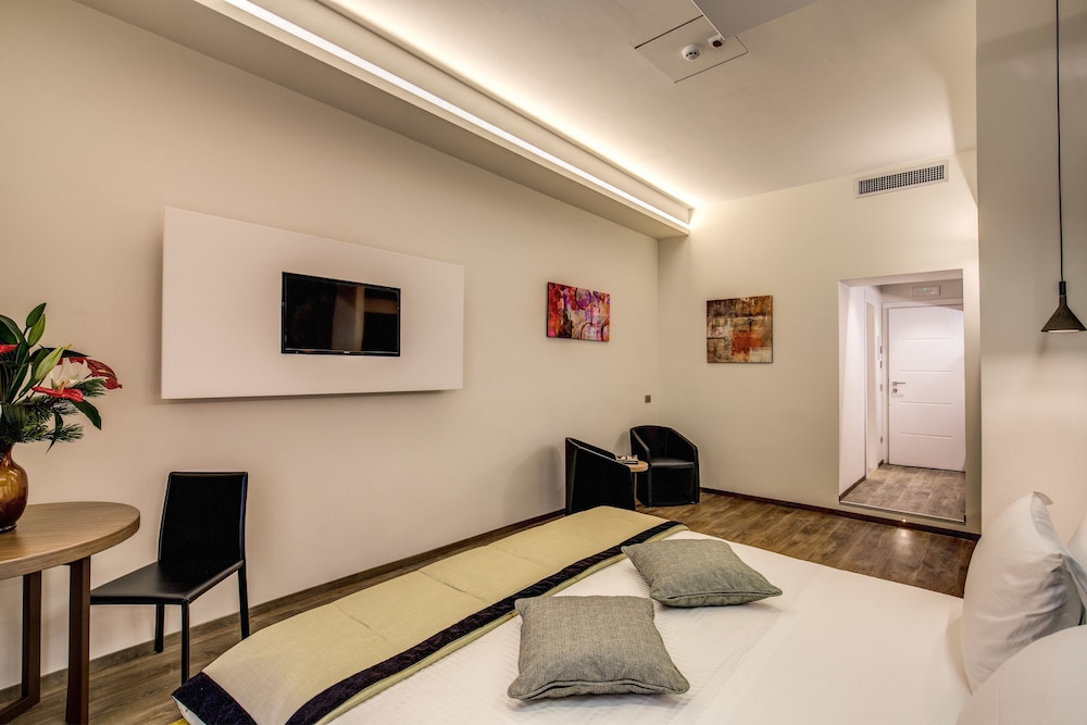 Triple Superior del hotel Trevi Collection. Foto 1