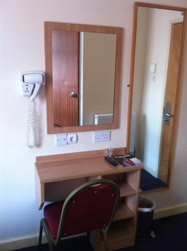 Habitación Individual con ducha y aseo privados del hotel Colliers. Foto 3