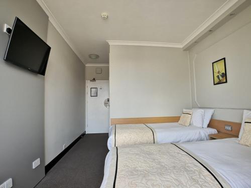 Habitación Doble Estándar - 2 camas del hotel Lancaster Hall. Foto 4