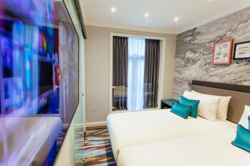 Habitación Doble - 2 camas del hotel OLIVER PLAZA. Foto 4
