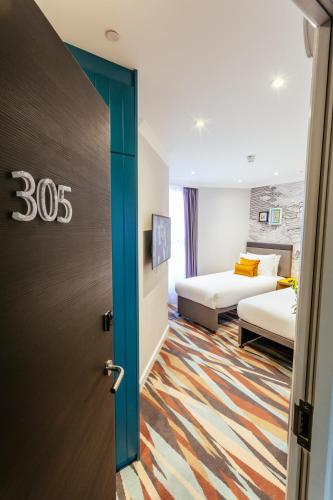 Habitación Triple del hotel OLIVER PLAZA. Foto 3