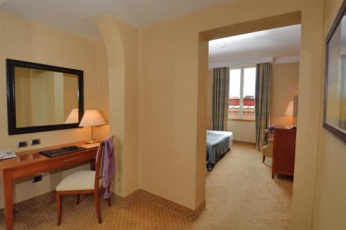 Habitación Cuádruple del hotel LH Hotel Lloyd Roma. Foto 1