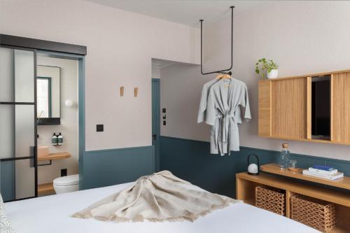Suite Familiar del hotel Inhabit Queens Garden. Foto 3