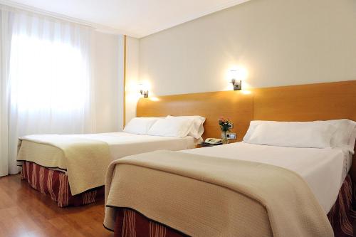 Habitación Doble con cama supletoria del hotel El Churra