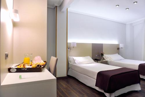 Habitación Triple Clásica del hotel El Churra. Foto 10