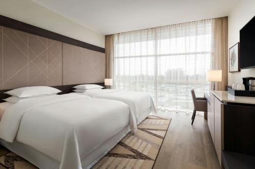 Habitación Doble Executive Club - Acceso al salón del club del hotel Sheraton Milan Malpensa Airport and Conference Center