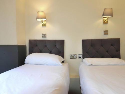 Habitación Doble - 2 camas del hotel Hyde Park Court. Foto 7