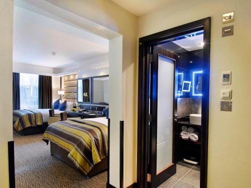 Habitación Triple Hyde Park del hotel Park Grand Mayfair