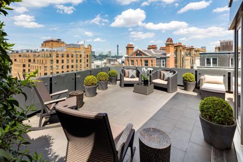 Suite de 1 dormitorio con terraza del hotel The May Fair, A Radisson Collection , Mayfair London. Foto 1