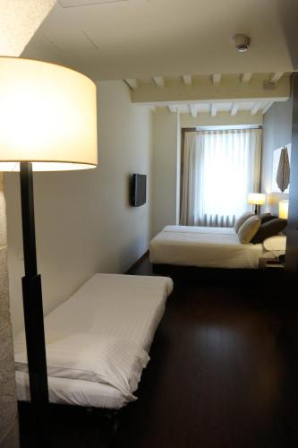 Habitación Familiar con galería del hotel Carrís Casa De La Troya