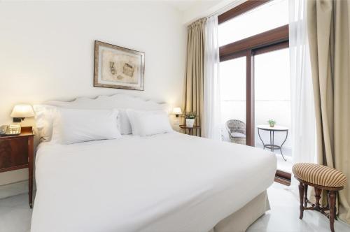 Habitación Doble Superior - 1 o 2 camas del hotel Amadeus Sevilla. Foto 8