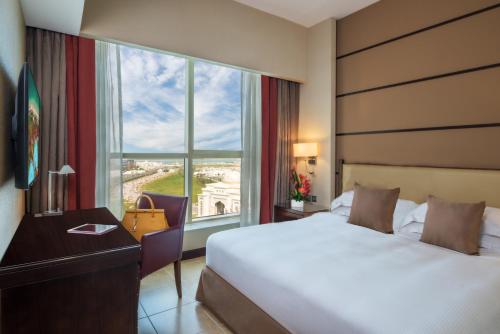 Apartamento de 1 dormitorio del hotel Khalidiya Palace Rayhaan By Rotana. Foto 1