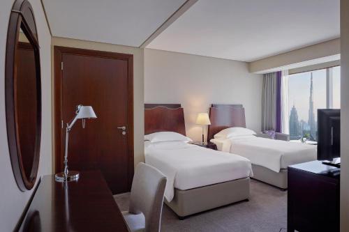 Habitación Doble con vistas al Burj Khalifa - 2 camas del hotel Rose Rayhaan By Rotana. Foto 3