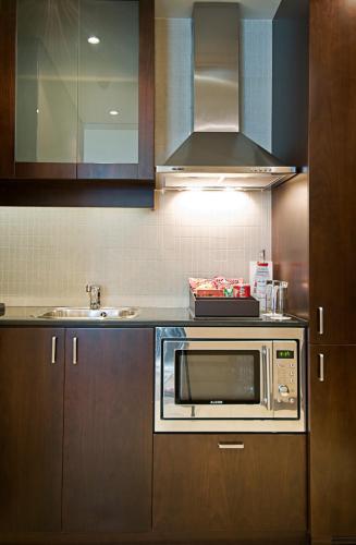 One Bedroom Suite with Complimentary Breakfast Buffet del hotel Rose Rayhaan By Rotana. Foto 4