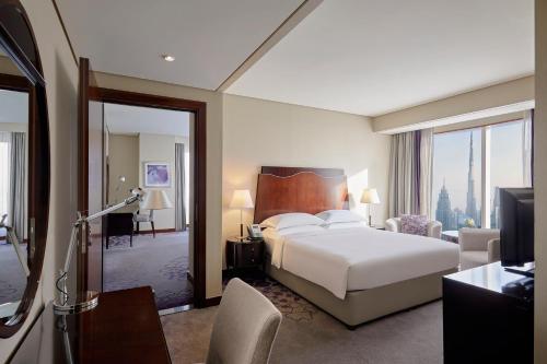 One Bedroom Suite with Complimentary Breakfast Buffet del hotel Rose Rayhaan By Rotana. Foto 6
