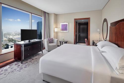 Guest Sky View Room del hotel Rose Rayhaan By Rotana. Foto 1