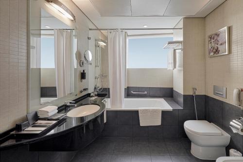 One Bedroom Suite with Complimentary Breakfast Buffet del hotel Rose Rayhaan By Rotana. Foto 4