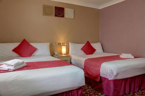 Habitación Estándar - 1 cama doble y 1 cama individual - No fumadores del hotel Best Western London Ilford. Foto 1