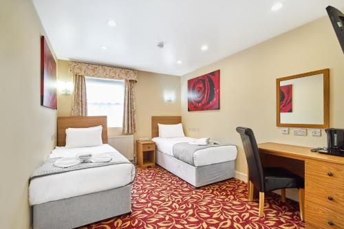 Habitación Doble Estándar - 2 camas - No fumadores del hotel Best Western London Ilford. Foto 1