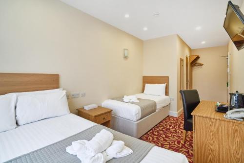Habitación Estándar - 1 cama doble y 1 cama individual - No fumadores del hotel Best Western London Ilford. Foto 3