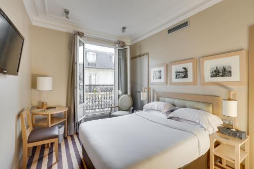 Habitación Doble Clásica del hotel Duret Paris. Foto 3