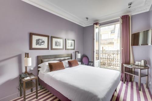 Habitación Superior - 1 cama grande del hotel Duret Paris. Foto 3