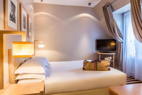 Habitación Superior - 1 cama grande del hotel Duret Paris. Foto 11