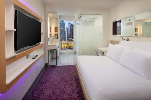 Habitación Premium con cama grande y vistas del hotel Yotel New York Times Square