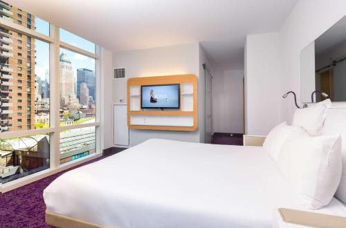 Habitación Esquinera de primera clase - 1 cama grande del hotel Yotel New York Times Square. Foto 4