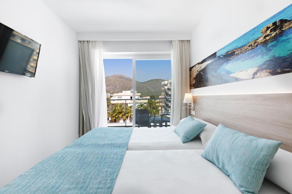 Habitación familiar del hotel Alua Boccaccio. Foto 1